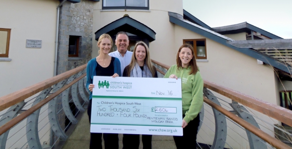 Graham Brown, Carla Lamb and Melanie Thompson from Pentewan Sands Holiday Park presenting the cheque to CHSW