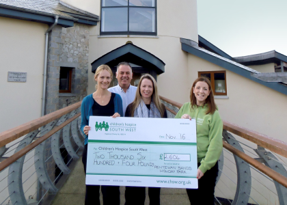 Graham Brown, Carla Lamb and Melanie Thompson from Pentewan Sands Holiday Park presenting the cheque to CHSW
